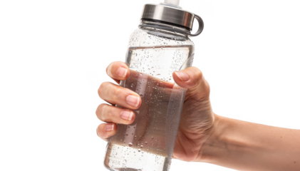 Closeup of hands gripping a reusable bottle outdoors symbolizing healthy hydration lifestyle choices supporting bladder function and overall wellness.