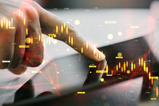 Hand touching tablet with illuminated financial chart overlay and data points in modern digital interface on blurred background concept of trading analytics. - Powered by Adobe