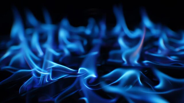 Abstract blue flames on a dark background creating a dynamic pattern
