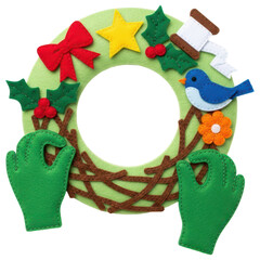 Green felt wreath with bird, bow, and holly leaves held by hands on transparent background