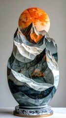 Marble mountainscape. The peaks rise towards an orange moon on white background