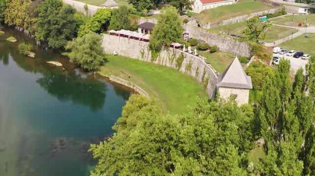 River and historic buildings in Bosnia aerial view