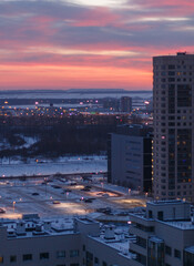 A soft pink sunset on a winter evening