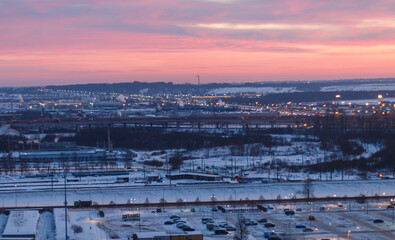 A soft pink sunset on a winter evening
