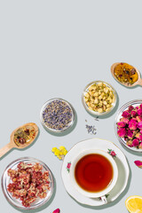Herbal Tea Flat Lay With Blossoms And Spices On Light Gray Background. Concept Of Natural Wellness, Herbal Remedies, Holistic Healing, Healthy Lifestyle, Organic Nutrition, And Tea Culture Content