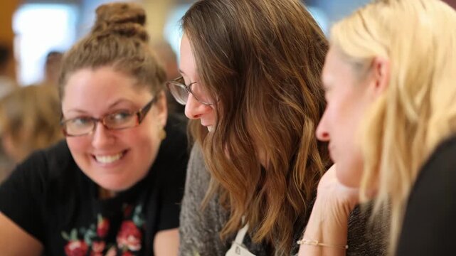 Closeup of a mentor guiding a small group during an orientation emphasizing handson learning and supportive QA.