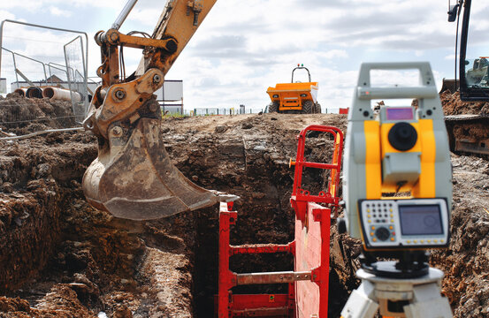 Close-up of Construction survey equipment otal station in use at a building site set by site engineer