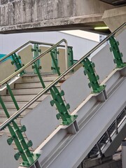 Gritty outdoor granite stairs with a faded yellow safety line, highlighting urban decay and public transit textures.