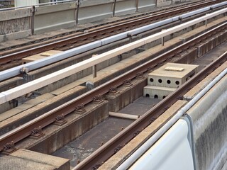 Elevated Light Rail Track Infrastructure with Concrete Plinth and Third Rail.