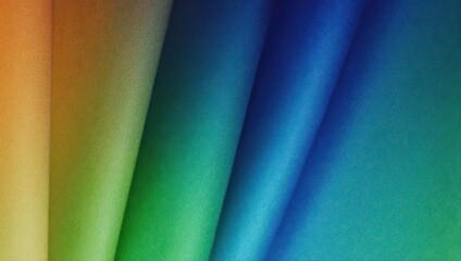 Abstract close-up of colorful, rolled paper or fabric, transitioning hues of orange to teal