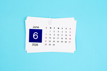 June Calendar 2026 page on blue background.