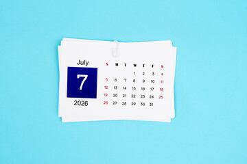 July Calendar 2026 page on blue background.