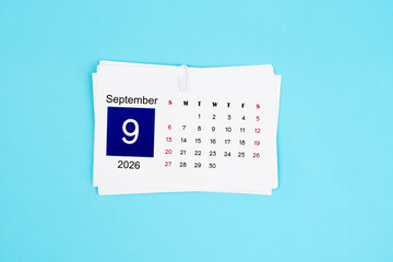 September Calendar 2026 page on blue background.