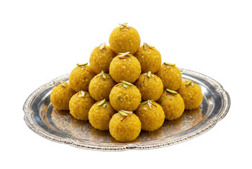 Indian Besan Ladoo sweets stacked in a pyramid