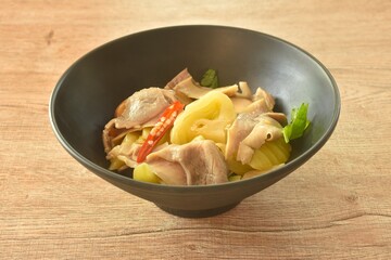 stir fried pickled cabbage with slice pork stomach and chili on bowl
