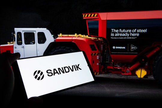 Sandvik AB logo on smartphone with their logo in background. Link&ouml;ping, &Ouml;sterg&ouml;tland, Sweden. 01-18-2026