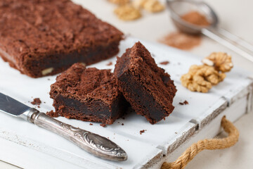 Homemade chocolate brownies with walnuts. Truffle pie. Delicious dessert close-up. Selective focus