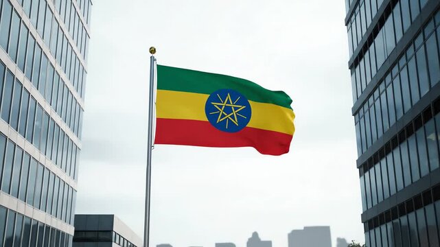 Ethiopian flag waving in the wind with city skyline background