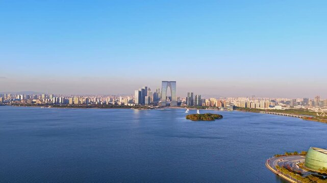 Aerial view of the skyline of the Gate to the East at Jinji Lake, Suzhou, Jiangsu Province, China.
