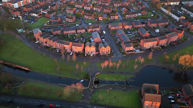 Aerial video of the Miles Platting district in Manchester, showcasing modern residential housing, canal-side walks, and the mix of new and refurbished urban architecture.