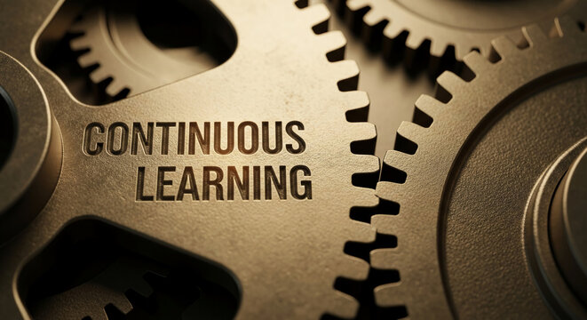 Close-up of metallic gears, "Continuous Learning" engraved, symbolizing constant growth and development in education or professional skills
