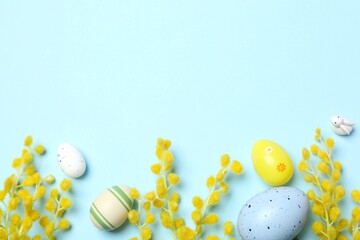 Colorful Easter egg decorations and vibrant spring flowers on yellow. Easter celebrations, and the freshness of spring festivities