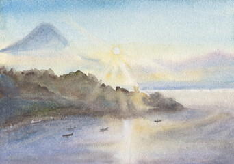 Sunrise over the mountains and the sea