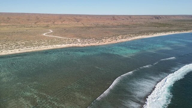 Aerial view of Oyster Stacks along Ningaloo Coast Western Australia with turquoise waters and rocky formations