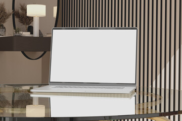 Blank Screen Laptop on Glass Desk with Natural Light