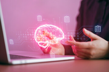 Visual representation of brain activity and digital tools used in analysis during a learning session in a modern workspace