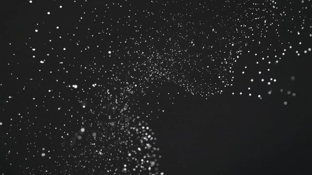 Sparkling particles flying through dark space with dynamic movement
