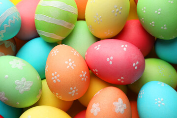 Naklejka premium Many painted Easter eggs as background, top view