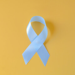 Blue ribbon on color background. Men's Health Upload date