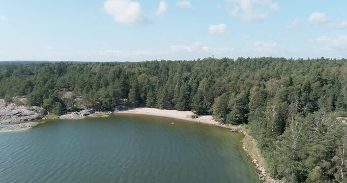 Aerial view of Diksand beach in summer with clouds in the sky, Pentala, Espoo, Finland.