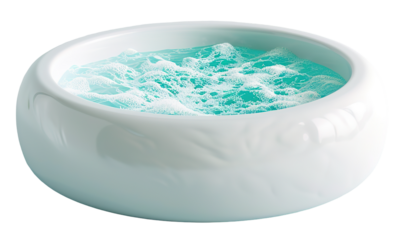 Bubbling water fills a circular jacuzzi pool. The pool's design is simple and features an all-white exterior. The backdrop is transparent with no other elements present
