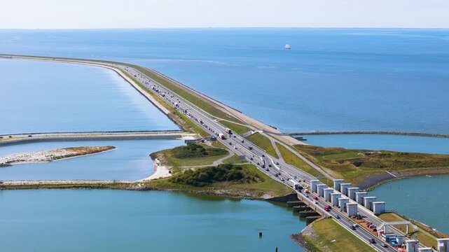 line massive white drainage sluices manages water flow stevinsluizen complex monumental engineering separates sea inland lake afsluitdijk netherlands long wadden infrastructure 