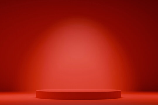 Minimalist red podium on a studio background with soft spotlight. Empty round pedestal for product presentation and display. Clean professional 3D render with copy space for cosmetics or luxury.