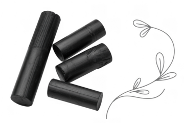 Black charcoal cylinders with gray plant isolated on a transparent background