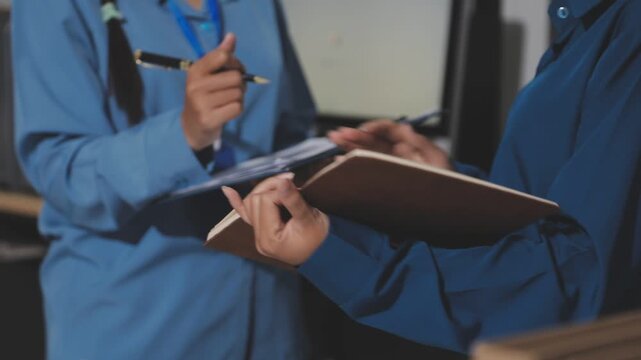 Asian male financial officer or accountant checking investment results Financial budget analysis Planning to summarize results and report to the meeting Audit concept and investment results.
