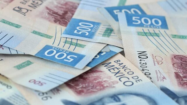 Mexico money rotating, Lot of 500 Mexican pesos banknotes, Concept of financial success, lottery or big win