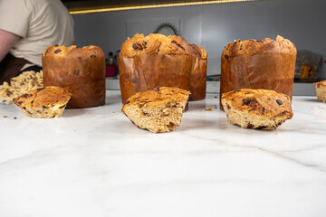 Panettones without the top waiting to be filled.