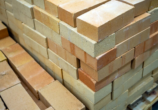 A pallet of fireclay bricks at a building materials store. (Shallow depth of field)