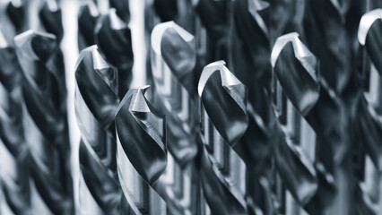 various types of drill bits milling cutter. display is organized and bits are arranged in way that makes it easy to see the differences between them © Aleksandr Matveev