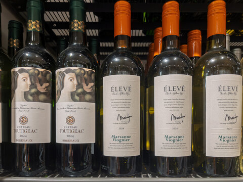 Assorted Wine Bottles Displayed on Shelf