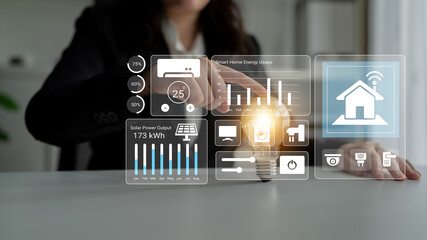A businesswoman interacts with a smart home energy management interface, showcasing energy data analytics, solar output, and usage metrics for better efficiency. Gantry