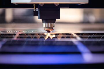 Modern metalworking plant CNC milling machine. Processing and laser cutting for metal in the industrial. Motion blur. Industrial exhibition of machine tools.