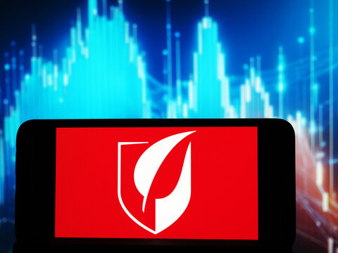 In this photo illustration, Gilead Sciences, Inc. logo seen displayed on a smartphone.