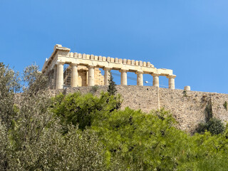 Obraz premium Parthenon on Acropolis rock, blue sky, sunny day. Athens Greece.
