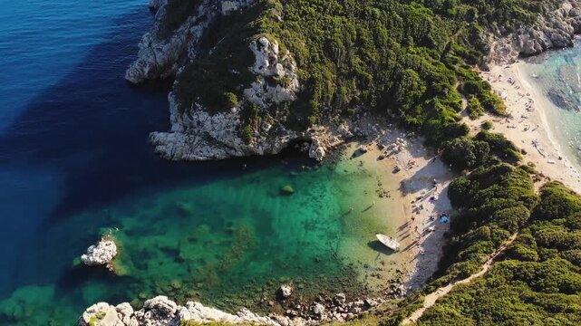Porto Timoni beach, Agios Georgios, near Afionas village, beautiful Greek landscape, Corfu island, Greece, with turqoise water and sea beach, Kerkyra, Ionian sea islands, summer sunny day
