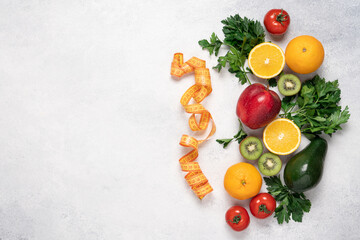 Healthy Eating and Weight Loss Concept with Fresh Vegetables, Fruits and Measuring Tape Flat Lay on Light Background with Copy Space
